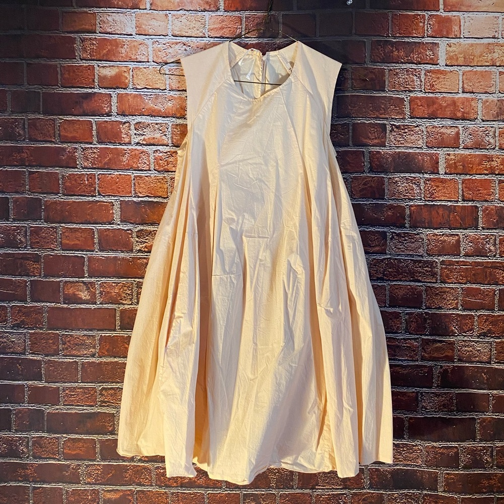 Elegant Cream Sleeveless Dress